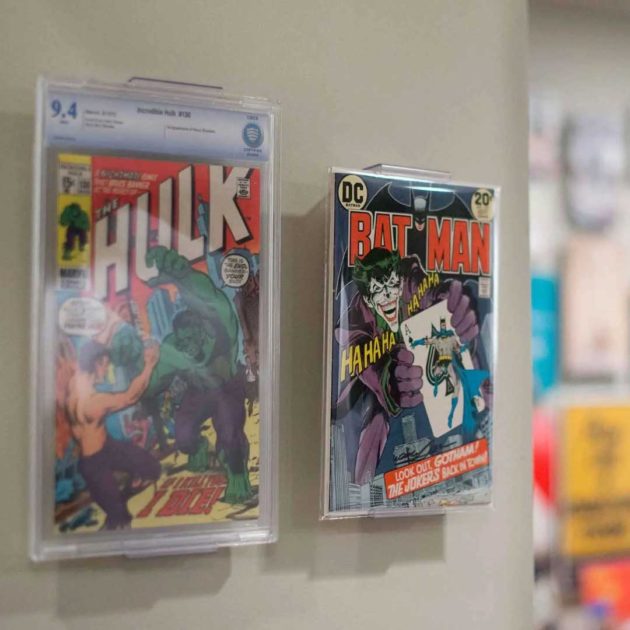 Wall mounts for showcasing comic books